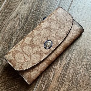 Coach wallet in signature canvas print with royal blue accents